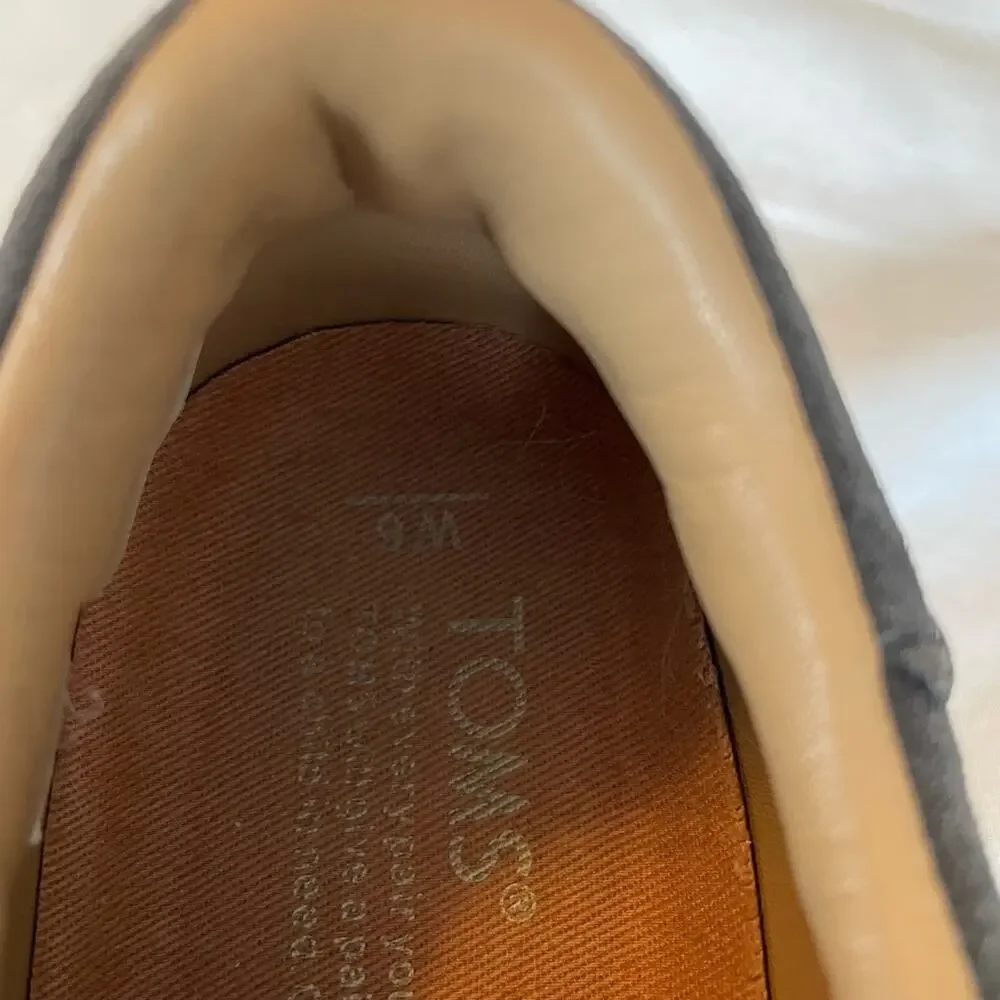 Tom’s gray suede casual sneakers.  Size 6